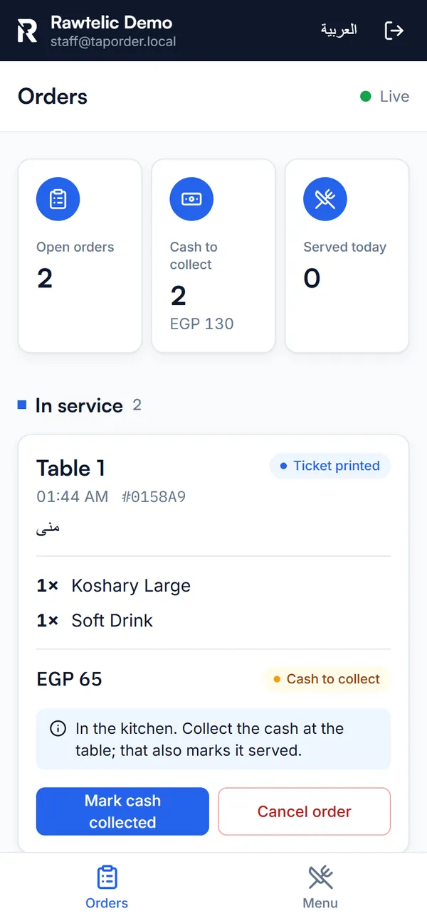 The staff screen on a phone: open orders, cash to collect, and an order for Table 1 with its ticket printed.